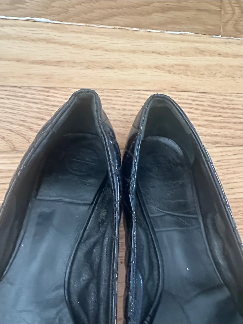 Tory Burch Black Quilted Logo Round-Toe Flats with Gold Emblem